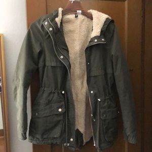 Coat with faux fur lining